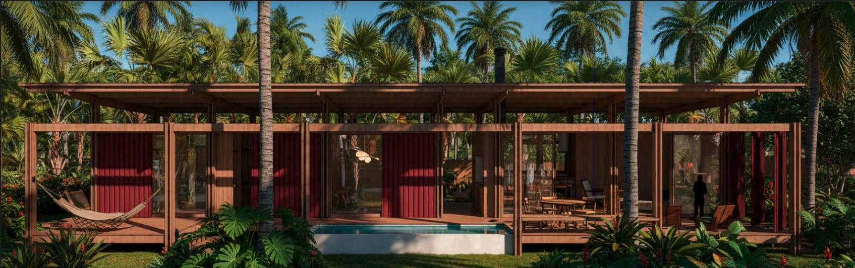 Casa Serena - Fachada com varanda e piscina entre coqueiros